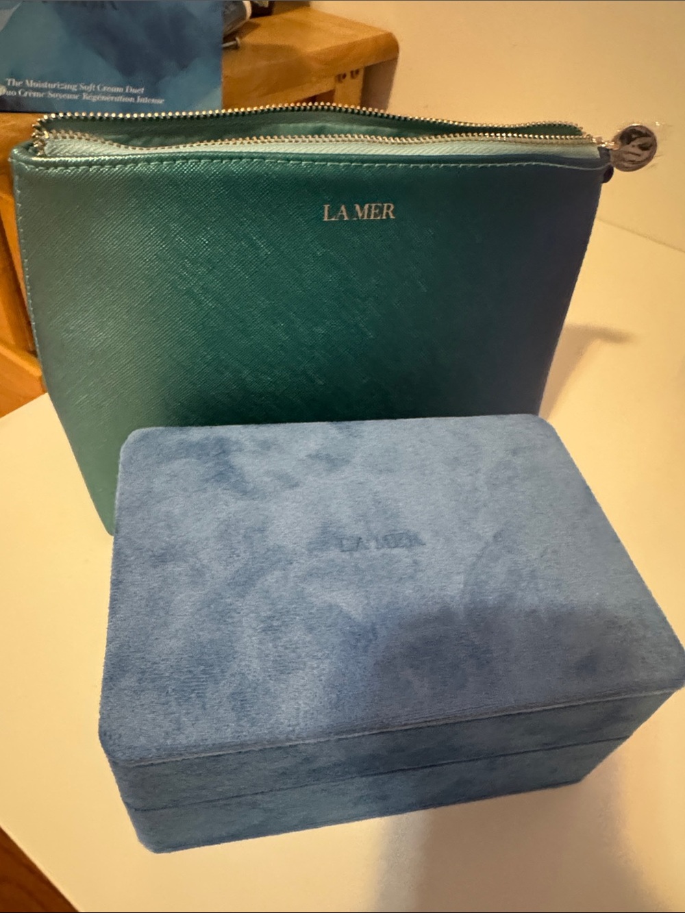La Mer Teal Zip Cosmetic Pouch with Blue Box
